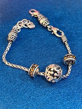 Brighton Beverly Glam Charm Bracelet with 3 charms.